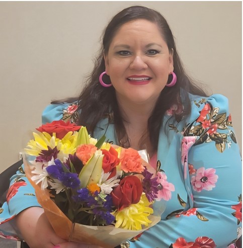 Erica with flowers from Dr. Khandelwal